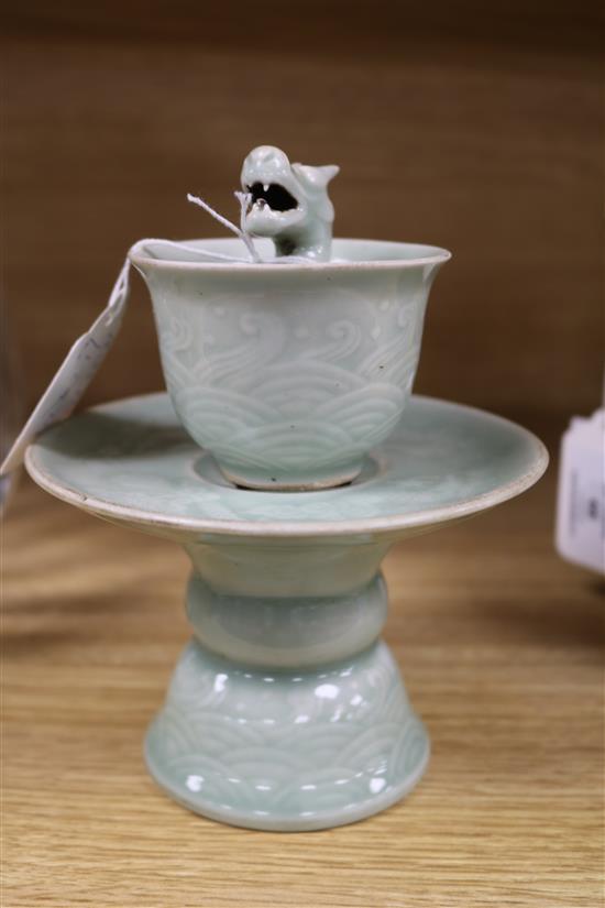 A 19th century Chinese celadon cup and stand